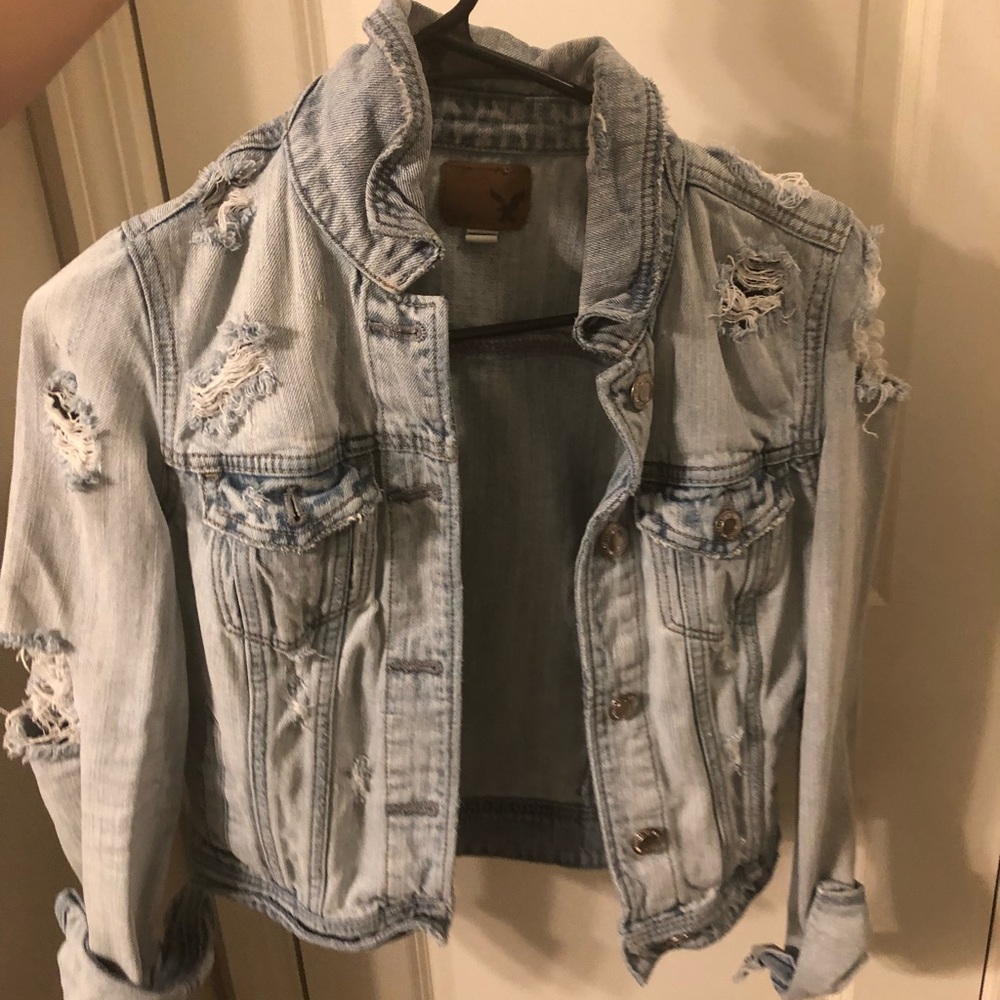Distressed denim jacket